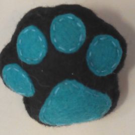 Broche “pegada” negro-turquesa